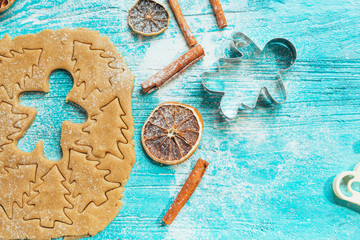 metal molds men love on the dough a blue wooden background