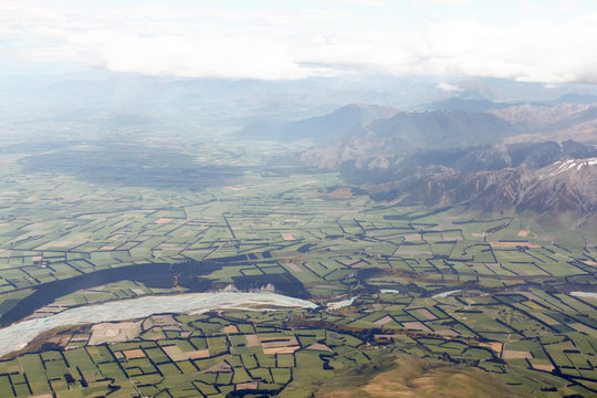 Aerial photo of landscape around Christchurch, New Zealand, South Island,  taken from airplane before landing to Christchurch.