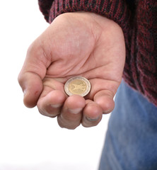 Old man holding pile of coins