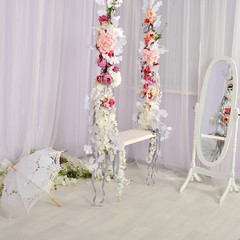 swing decorated with flowers