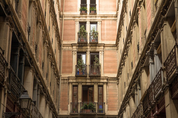 Fototapeta na wymiar house facade courtyard with balconies and windows