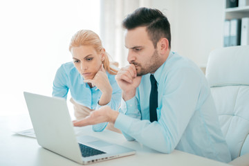 Fototapeta premium Young people working in the office