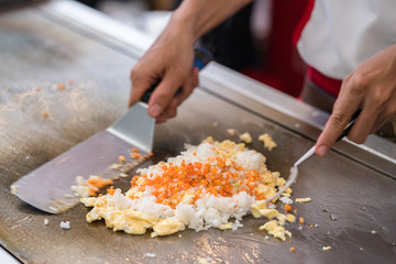 chef cooking homemade spicy fried rice