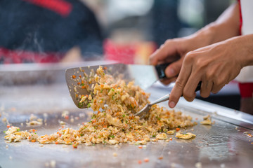 chef cooking homemade spicy fried rice