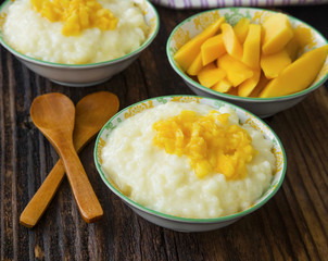 Rice milk pudding with mango fruits jam or topping