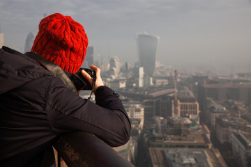 woman tourist on top of St Paul's cathedral, London