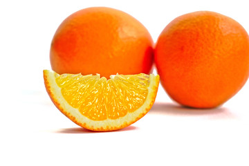Closeup of oranges on a white background