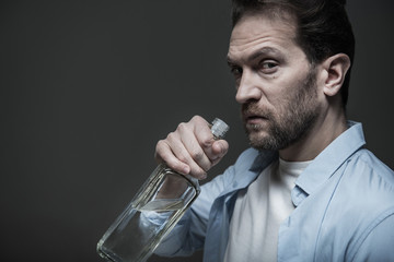 Incredulous male person looking on camera