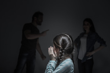 Little female person hiding her face