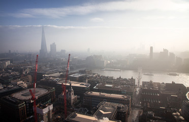 rooftop view over London on a foggy day from St Paul's cathedral, UK