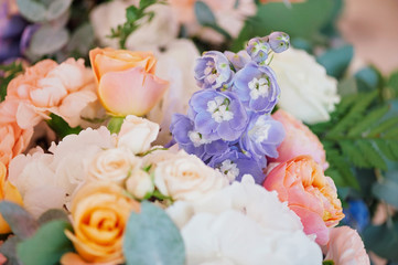 Wedding decorating bouquet of roses and petals, closeup
