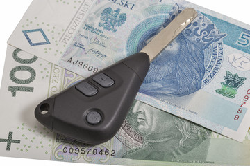 Car keys on Polish zloty notes background