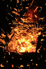 Firesparks in the night, holiday background
