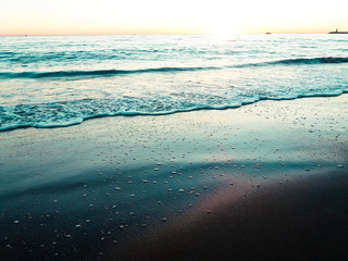 Natural sunshine over sea ocean water background surface