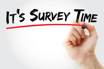Hand writing It's Survey Time with marker, concept background