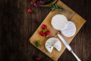 Cheese, radish, grapes and herbs