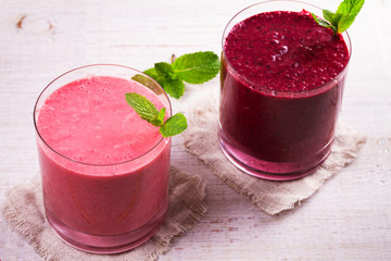Summer berries smoothie garnished with mint