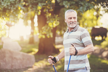 Sporty aged man smiling