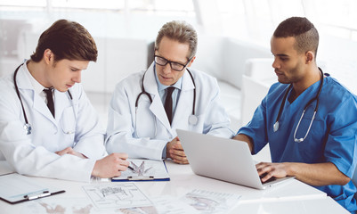 Handsome doctors working