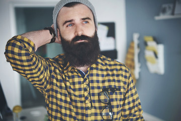 Front view of thoughtful man .