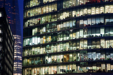 Fototapeta na wymiar windows of Skyscraper Business Office, Corporate building in London City, England, UK
