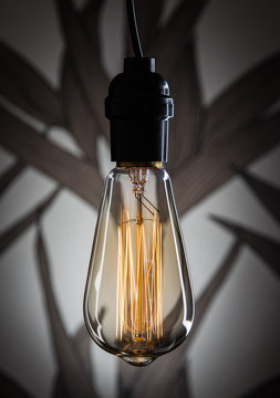 Vintage Light Bulb on Abstract Background