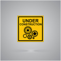 Warning attention sign.Under construction concept, draw with gear wheels.