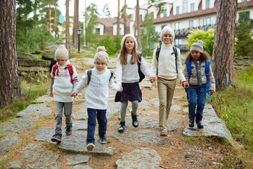 Obraz na płótnie Canvas Group of kids walking to school