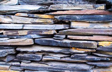 The walls made from overlapping of sedimentary stone