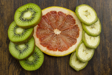kiwi grapefruit banana beautifully arranged fresh juicy vitamins tropical © TimofeyRM