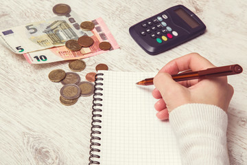 Cash counting. Money on the table. Euro coin stocks.