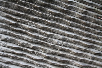 Marble with diagonal carved fluting
