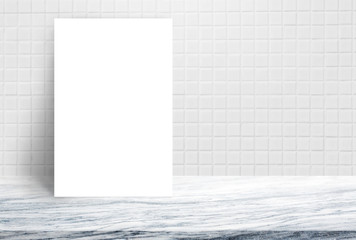 Blank White paper poster on stone table top at white ceramic tile wall,Template mock up for adding your design.