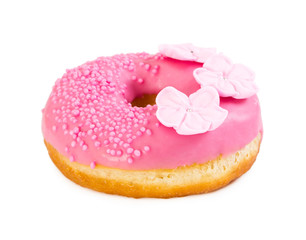Strawberry donut with pink glaze, decorative sprinkles and flowers
