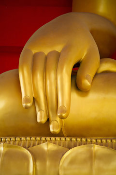 Hand of Buddha statue in Thailand temple.