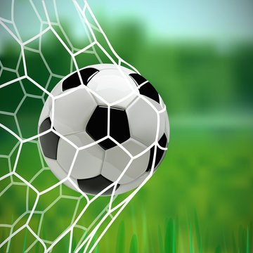 Soccer or Football Ball on green background.