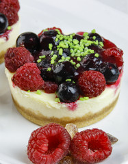 mini cheesecakes with mixed berries