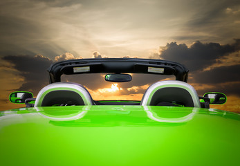 The green car with sunset