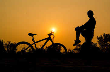 Obraz premium Silhouettes of mountain bike with man in action something