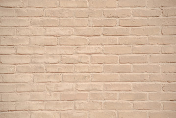 Beige grunge brick wall texture background