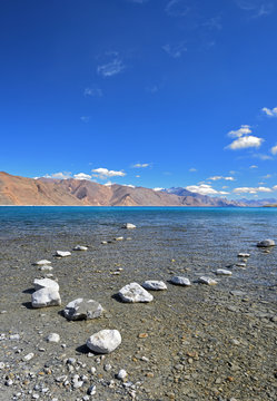 Stepstone path in vast Pangong lake, ladakh, India 