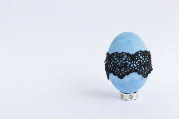Blue Easter egg design on white background