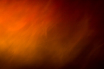 Abstract smoke background color on yellow, orange and red colours.