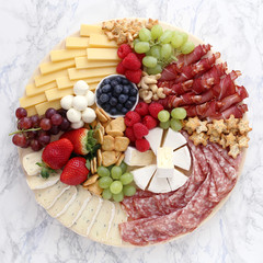 Cheese platte with ham, salami and fruits  © victoria p.