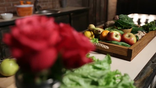 Fresh market fruits and vegetables in wooden tray