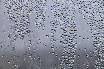 Spring. Raindrops on a sweaty glass.