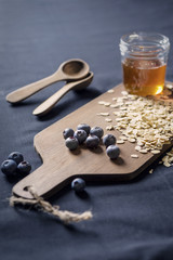 Fototapeta na wymiar Blueberries, oats and honey