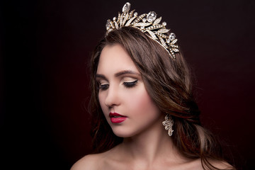 Beautiful girl with a tiara on her head