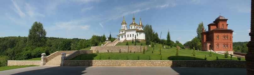 White Orthodox Church at summer panorama