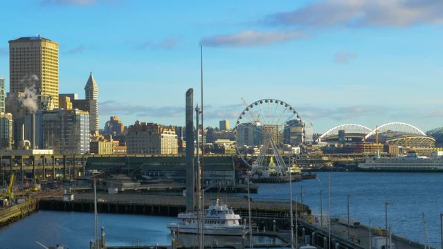 Seattle, WA - January 30, 2017. Port of Seattle. Skyscrapers on a background of blue sky. Downtown Seattle, Pier 66. City landscape video. 4K, 3840*2160, high bit rate, UHD